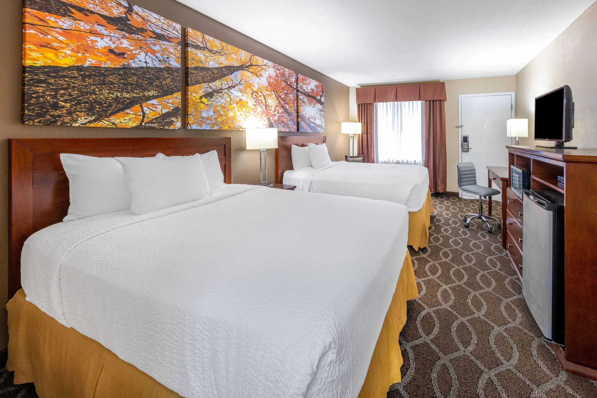 Two queen guest room at Days Inn by Wyndham St. Robert